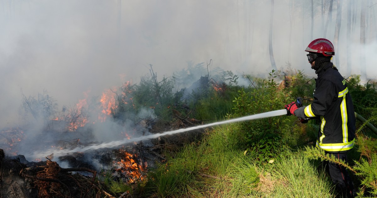 Firefighters in France hold back vast wildfire as heat returns to test their grip